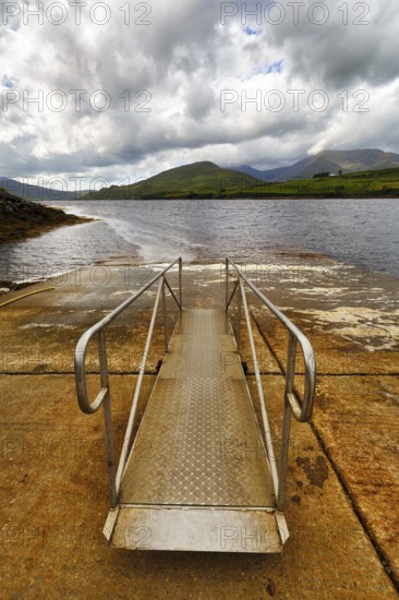 Empty jetty, Killary Harbour, fjord, rain clouds, Connemara, Galway, Wild Atlantic Way, Ireland,