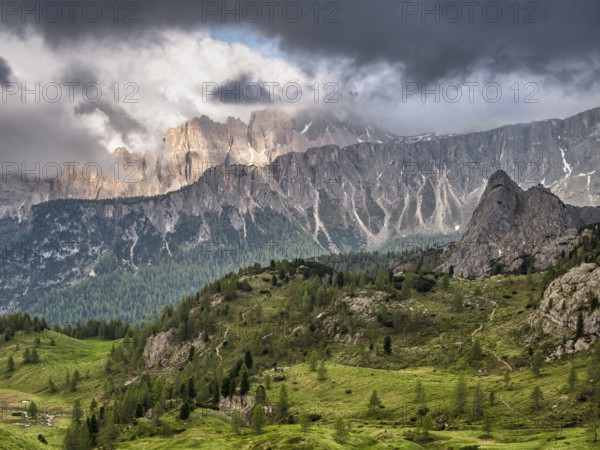 On the way to the Cinque Torri, view of the surrounding mountains, cloudy mood, Dolomites, Cortina