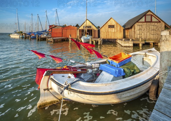 Holiday homes, sailing boats and fishing boats in the harbour on Saaler Bodden, Althagen,