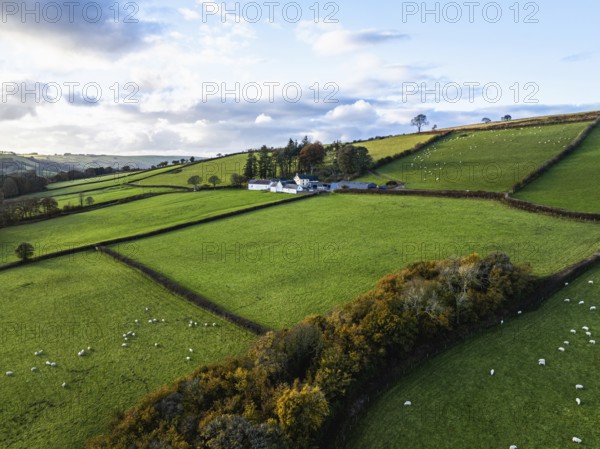Farms over Trecastle from a drone at sunset, Brecon Beacons National Park, Powys, Wales, England,
