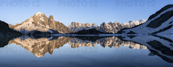 Mountain landscape in the evening light, water reflection in Lac Blanc, mountain peak, Aiguille