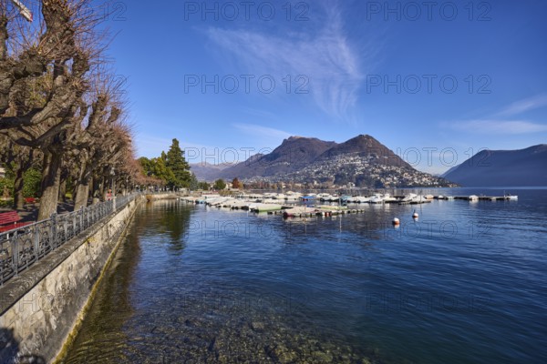 Lake, mountains, haze, marina, trees, lakeside promenade, blue sky, veil clouds, Lake Lugano,