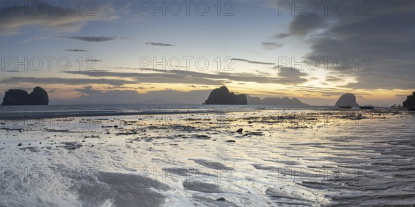 Structures in the sand, sunrise at low tide on the beach of Koh Ngai Island, Andaman Sea, Satun