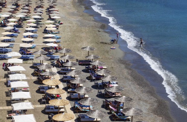 Parasols on Agia Galini beach, Agia Galini, south coast, Crete, Greece, Europe