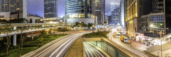 Hong Kong at night traffic with streets and skyscrapers panorama in Hong Kong, China, Asia