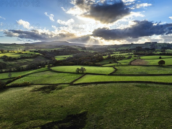 Farms over Trecastle from a drone at sunset, Brecon Beacons National Park, Powys, Wales, England,