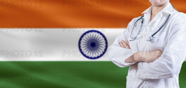 Doctor with crossed arms on India flag. India Health and Care concept. Female doctor on India flag