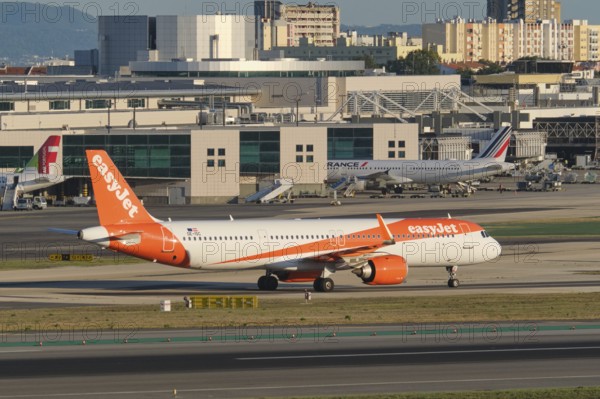 Lisbon, Portugal - September 2, 2023: easyJet Airbus A321-251NX passenger plane taxi on runway in