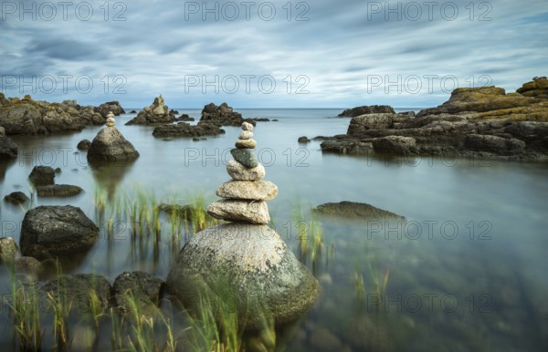 Rocky coast with cairns, Allinge-Sandvig, Bornholm, Denmark, Europe