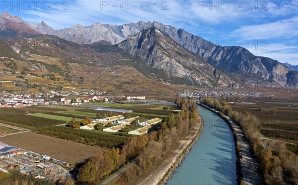 The valley of the Rhone, view upstream towards Leytron and the Haut de Cry massif, Riddes, Valais,