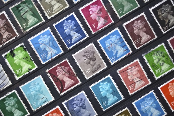 Old British postage stamps depicting the queen Elizabeth II