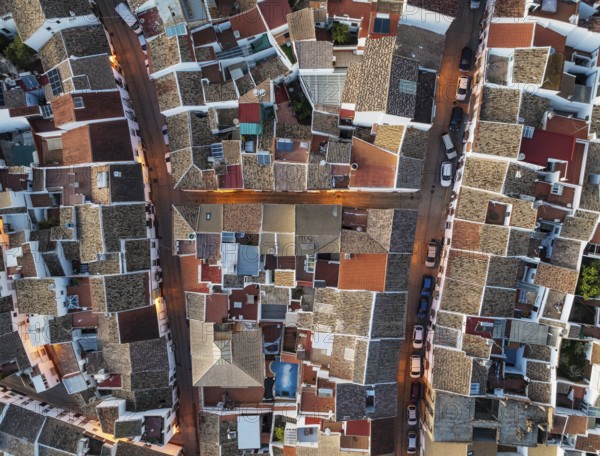Streets and rooftops in the White Town of Olvera. Aerial view. Drone shot. Cádiz province,