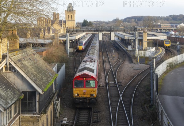 EMR British Rail Class 66 freight train and LNER Class 801 Azuma passenger train, Lincoln railway