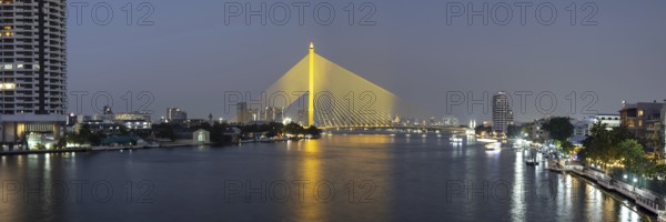 The illuminated Rama VIII Bridge over the Mae Nam Chao Praya, Bangkok, Thailand, Asia