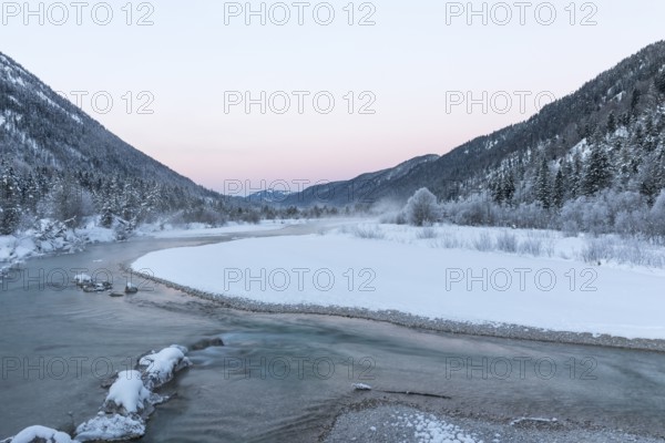 Isar valley in winter at temperatures of minus 18 degrees Celsius. Snow covered landscape with the