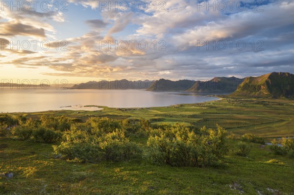 View of the coast and mountains from Mount Hoven, Gimsoy, Lofoten, Norway, Europe