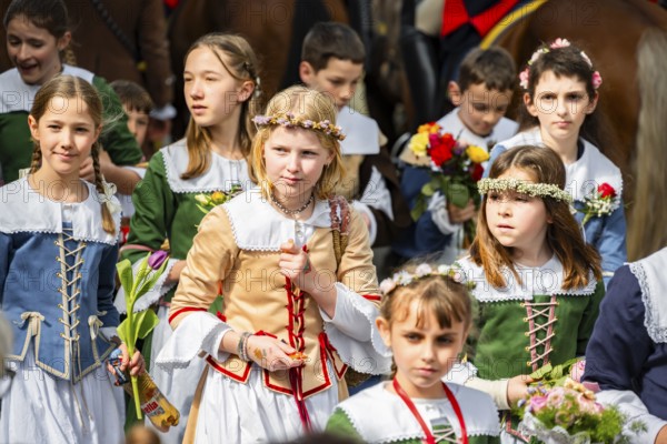Children at the parade of historically costumed guildsmen, Sechseläuten or Sächsilüüte, Zurich