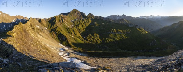 Mountain landscape at sunrise, view of mountain peaks of the Venediger group and into the