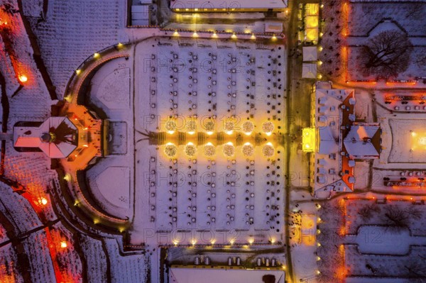 Aerial view of Wackerbarth Castle with castle park, belvedere and vineyards with snow and Christmas