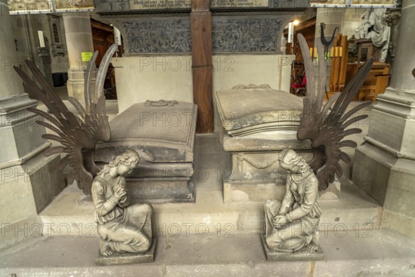 Angels and gravestones in the Protestant parish church of St Michael, Schwäbisch Hall,