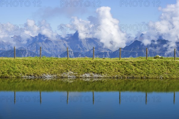 Artificial lake, snow pond, at the mountain station of the Kanzelwand cable car, panoramic view of