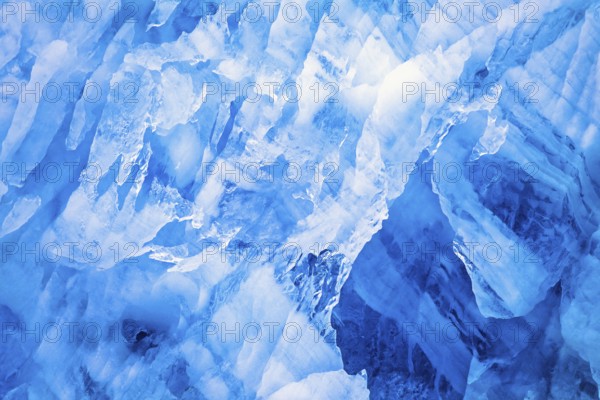 Natural ice patterns on a glacier wall in Arctic, Svalbard, Norway, Europe