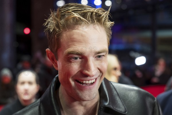 Robert Pattinson gives an interview on the red carpet at the Special Gala of the film Mickey 17 at