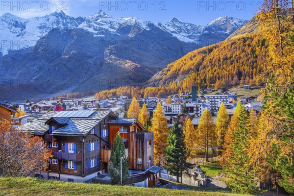 View of the village with Dom 4545m and Täschhorn 4491m of the Mischabel group in autumn, Saas-Fee,