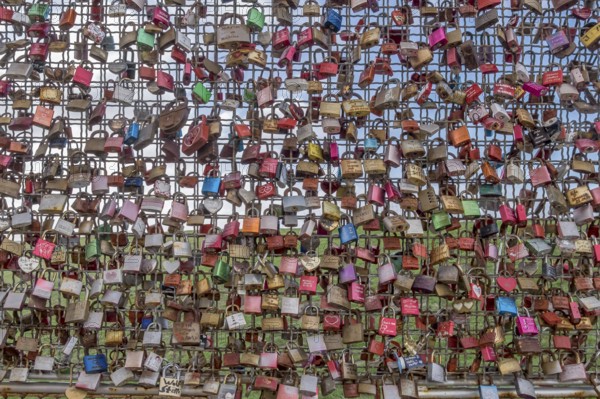 Lattice with love locks, at the Pilsum lighthouse, Pilsum, Krummhörn, Lower Saxony, Germany, Europe