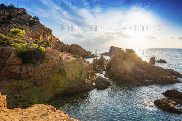 Red rocks and sea, Spiaggia Su Sirboni, sunrise, near Tertenia, Province of Ogliastra, Sardinia,