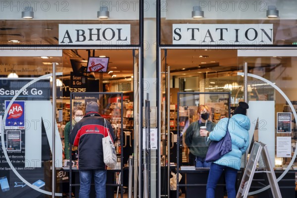 Cologne, North Rhine-Westphalia, Germany - Click and Collect in a bookshop, retail in times of the