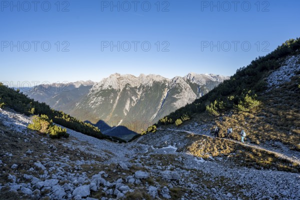 Mountaineer on a hiking trail, descent from the Große Arnspitze, view of the Karwendel mountains,