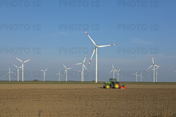 Wind farm, wind power plants, tractor, Reußenköge, North Frisia, Schleswig-Holstein, Germany,