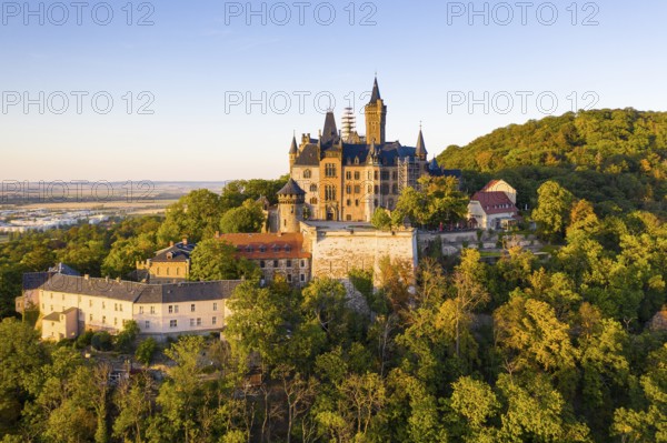 Castle on the Schlossberg in the evening light, aerial view, Wernigerode, Saxony, Germany, Europe