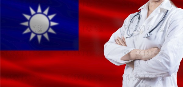 Doctor With Crossed Arms On Taiwanese Flag. Taiwan Health And Care Concept. Female Doctor On
