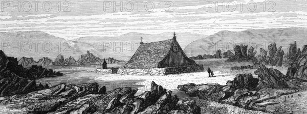 Grass-covered wooden church in Iceland, grass sod house, rocks, volcanic rock, volcanic landscape,