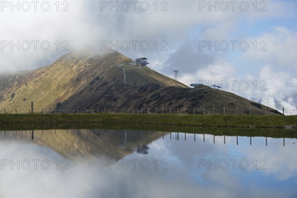 Artificially created lake, snow pond, feeds the snow cannons that completely cover the slopes of