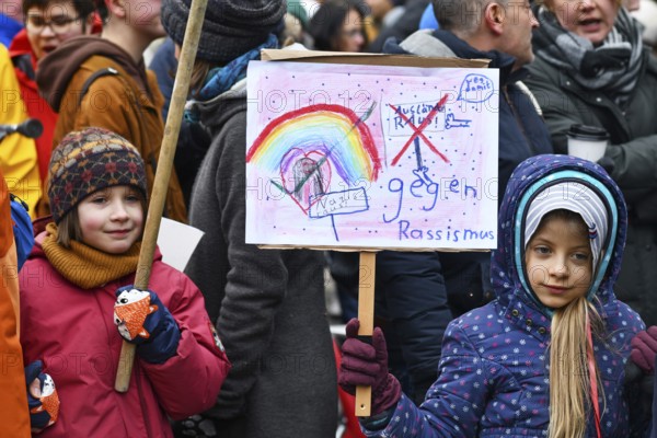 Heidelberg, Germany - February 12th 2025: Children with signs at protest against far-right