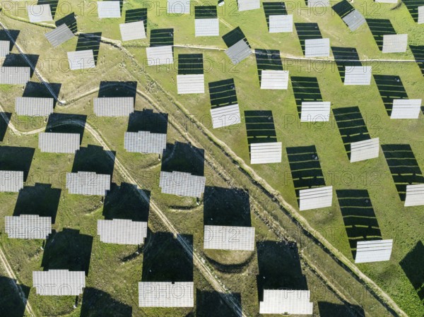 Rows of solar panels at a photovoltaic plant near town of Espejo. Aerial view. Drone shot. Córdoba