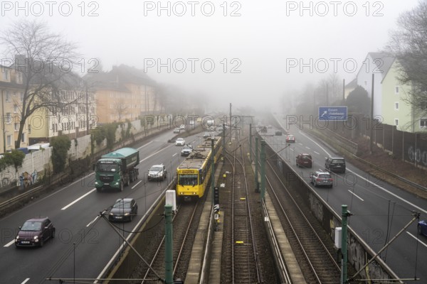 Dense fog, with visibility sometimes less than 100 metres, A40 motorway, city passage in Essen,