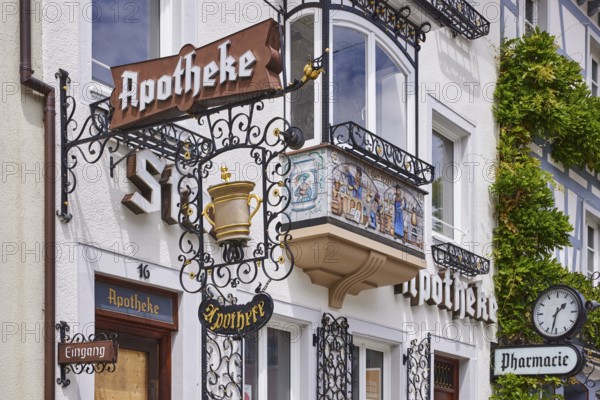 Historic pharmacy, nose sign, pharmacy, facade clock, historic building, old town, Wolfach, Black