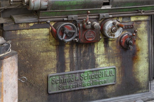 Detail with company sign of a workbench in the production hall of engine valves, formerly Dietz &