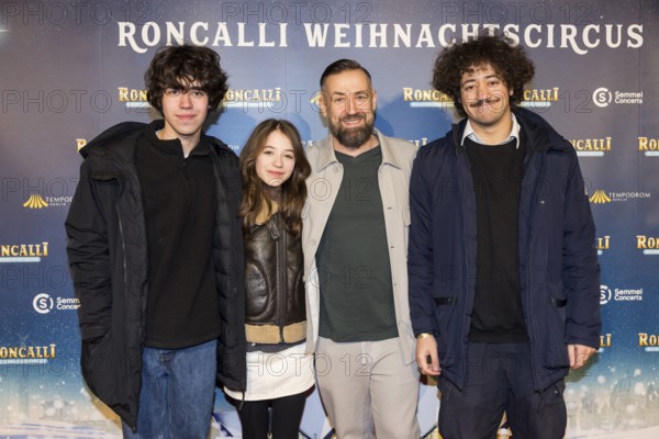 Citizen Lars Dietrich with his children Milo, Mavi and Sean at the premiere of the 20th Original