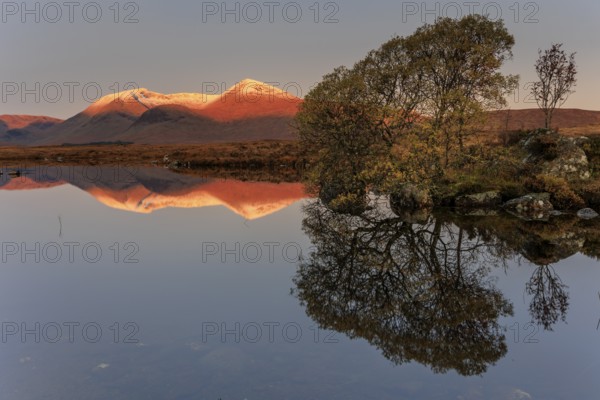 Mountains reflected in lake, morning light, morning mood, still, autumn, snowy, Lochan na