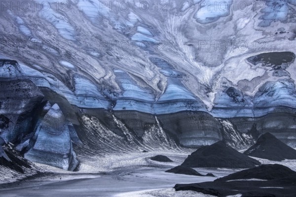 Mýrdalsjökull glacier with layers of black volcanic ash, ice cap on the top of the active Katla
