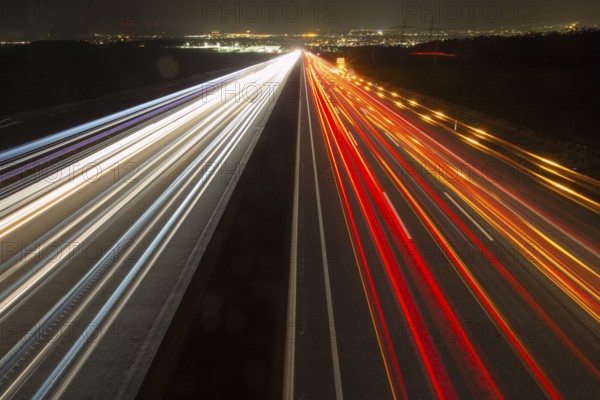 A7 Motorway, Autobahn, beside Kassel at night with light trails from the traffic headlights and