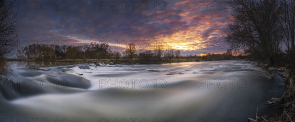 Long exposure of a waterfall at sunset, winter, panorama, river, Leine, Neustadt am Rübenberge,