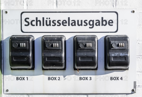 Key distribution boxes, safes, at a small hotel, guests receive a code with which they can open the