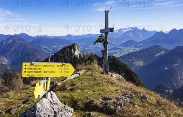 Old summit cross on the Schwarzer Berg with a view of the Dachstein massif, Golling,