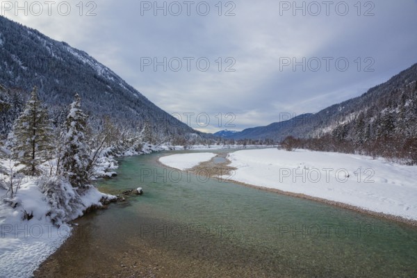 Isar valley in winter at temperatures of minus 18 degrees Celsius. Snow covered landscape with the